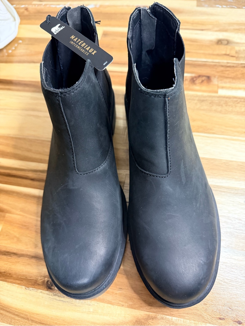 NWT Sorel black leather Chelsey ankle boot. Waterproof. Preppy western flannel
